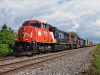 The sun peaks out as CN 327 heads west on the Kingston Sub with CN 8339, CN 8342, CN 4903 for power. Generally running with CSXT power, CN power has become more common recently.