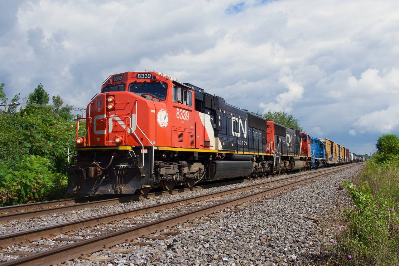 The sun peaks out as CN 327 heads west on the Kingston Sub with CN 8339, CN 8342, CN 4903 for power. Generally running with CSXT power, CN power has become more common recently.