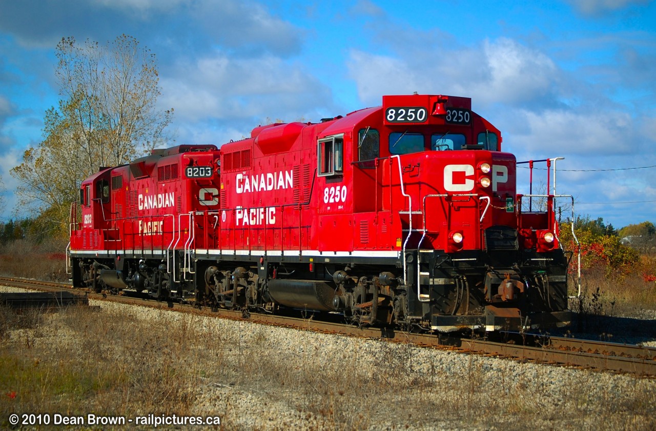 Pair of CP GP9u 8250 and CP GP9u 8203 heading light power from Welland to CN Southern Yard.