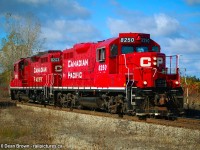 Pair of CP GP9u 8250 and CP GP9u 8203 heading light power from Welland to CN Southern Yard.