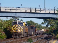 CN 3959 leads CN 369 through an s-curve as it approaches Dorval Station.