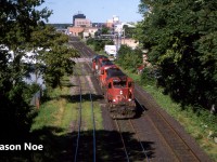 A CN eastbound light power move is seen rolling through London, Ontario on the Dundas Subdivision. The consist included; CN 5210, GTW 6416 and GTW 5923 with both trailing units repainted in the current CNNA scheme at the time. 