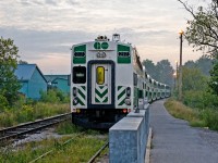 GO cab car #217 sits just north of the station in Stouffville with a 7-car train and F59PH 561 on the other end of the consist, about to spring to life to bring a train full of morning commuters to the big city.  This would be the second of two weekly-only morning trains to Toronto Union Station. Times sure have changed, as today the active line has been extended past this location and service is available more or less all-day, all-week. Significant improvements have also made to the track and other infrastructure. While changes were obviously necessary and positive, there was something fascinating about riding the line back then; old, jointed rail on a single-track line, mostly overgrown with grass and weeds while passing through backyards, fields and forests. I believe the maximum speed anywhere on the line back then was 50mph, but I could be mistaken. For a railfan like me, it was fun riding in the cab car and looking forward down the line (it was especially rocky once the train left Stouffville!), or behind the locomotive on the northbound trip, listening to the seemingly non-stop use of the beautiful K5LA horn for the many grade crossings. A major difference from the more sophisticated Lakeshore line at the time. I wish I had it in me to photograph the line at other areas along the way, but a student schedule and limited time (and foresight!) prevented that from happening.