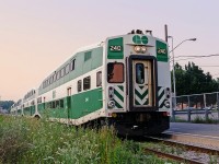 GO cab car #240 sit at Markham on a warm late August evening in 2001, ready to take a (very) light load of commuters down to Toronto Union Station and points in between. At the time, GO began modestly expanding service on the Stouffville line, with a morning and evening turn from Toronto Union Station to Markham and back, in passenger service both directions (no deadheading equipment moves). I took this opportunity to ride up and back on both the morning and evening runs a few times. The 10 minutes or so for the turn in Markham afforded the possibility of a few quick pictures. The 240 remains on GO's roster as of this posting, but the cab controls have been removed, and it is used as a mid-consist regular coach. 