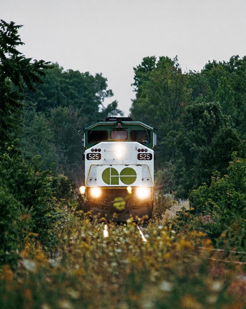GO F49PH #525 heads up a train through the woods and weeds near Stouffville, Ontario, in the early 1990s. This is a scan from a print in my collection, which was given to me by a GO Transit employee in the early '90s- original photographer unknown. I like the memory of how rural this line really was back then.