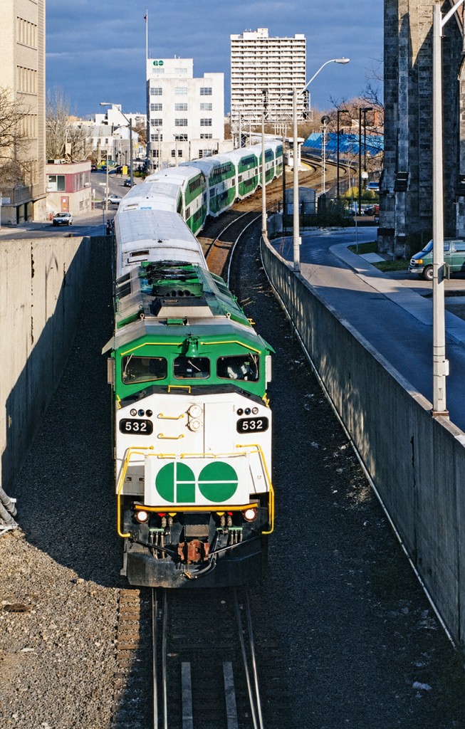 GO F59PH #532 is about to duck into the Hunter Street tunnel after departing the Hamilton GO Centre with an equipment move back to Willowbrook Yard. It was New Years Eve and GO ran early trains home so people could head to festivities with plenty of time to spare.