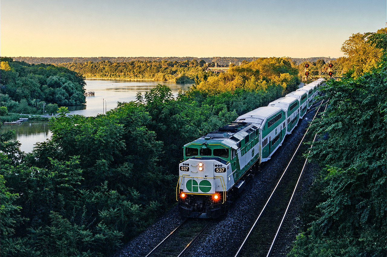 GO F59PH #537 leads one of three morning rush hour trains through Bayview Junction, on the way from Hamilton to Toronto Union Station with some nice golden light hitting the bay and escarpment in the background. The 537 had recently been overhauled, however had not yet received its air conditioning unit over the cab.