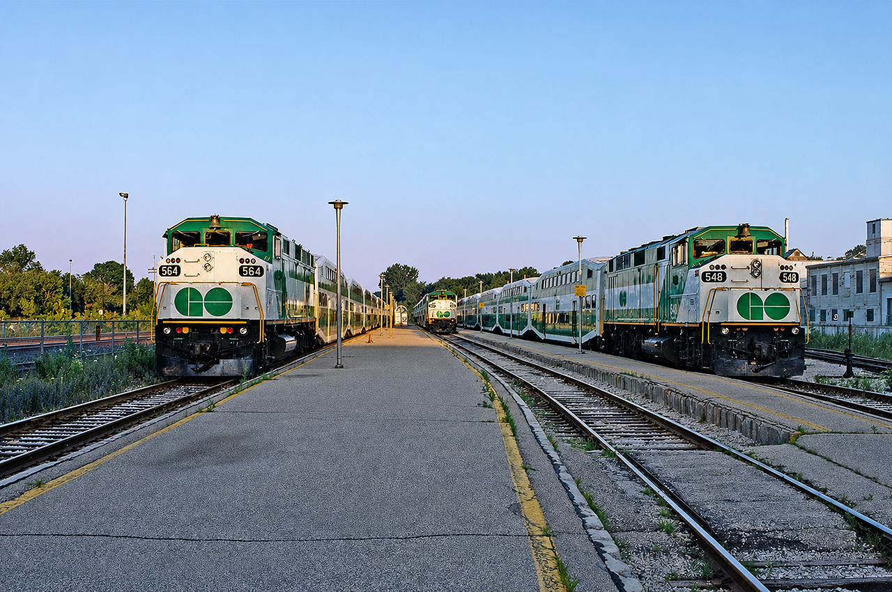 A trio of GO F59PHs prepare for the morning rush hour at Georgetown. There is a fourth train lurking behind the 548's consist to the right. Recorded locomotives were: 554 with the shortest train (6 cars) in the background on the second track to the left- this was the first to depart for Toronto Union Station. 548 was next with a rack of 9 bilevels, followed by 564 and 10 bilevels. Finally, unit 543- on the fourth track to the right- would vacate the GO platforms with her 8 bilevels and the scene would be empty until the parade began returning in the mid-afternoon through evening. Funny, I recorded the consists but failed to note the exact day, go figure...