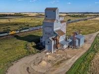 The westbound Canadian cruises past the elevator at Reford with VIA 6434, VIA 6420 and VIA 6441. 