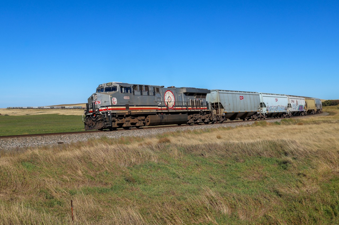 Bound for The Crow, CPKC 319-916 descends the grade into Webb, Saskatchewan.  At Dunmore, this train will take the Taber Sub to Lethbridge and then head across Crowsnest Pass and onto the UP at Eastport, Idaho.  We were heading for The Hat, so this was a great train to follow west across the scenic Maple Creek Sub.