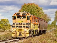 It’s probably been about a decade since I last followed the original Goderich Exeter. Back then business on the line was still pretty steady, typically at least 5 days a week. Back then the line to Hensall and beyond was still on shaky ground but at least served regularly. Today things are different on the GEXR the line to Goderich see service once or twice a week while Hensall sees very limited service. This day I originally hoped to do the run to Goderich and back for old time sake but am thankful they took the more rare trip to Hensall. From what I hear the line is no longer served in the winter months due to heavy snow and bad track conditions. This day PRSL cab GP38 2117 is seen making the 10mph trip towards Hensall with four BNSF hoppers in tow. The train will return north a few hours later with the same number of cars. The train is seen passing farmland and grinding rust off the rails near Brucefield. 