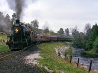 Ontario Rail Association's ex CPR D10 1057 is shown at Cataract, a bit north of the junction switch with the Elora Sub, as fans disembark for a runpast along the Credit River.

<br><br><a href=https://www.railpictures.ca/?attachment_id=59790>Pausing in Mississauga</a>
<br><a href=https://www.railpictures.ca/?attachment_id=59439>Mississauga runpast</a>

<br><br><i>Scan and editing by Jacob Patterson.</i>