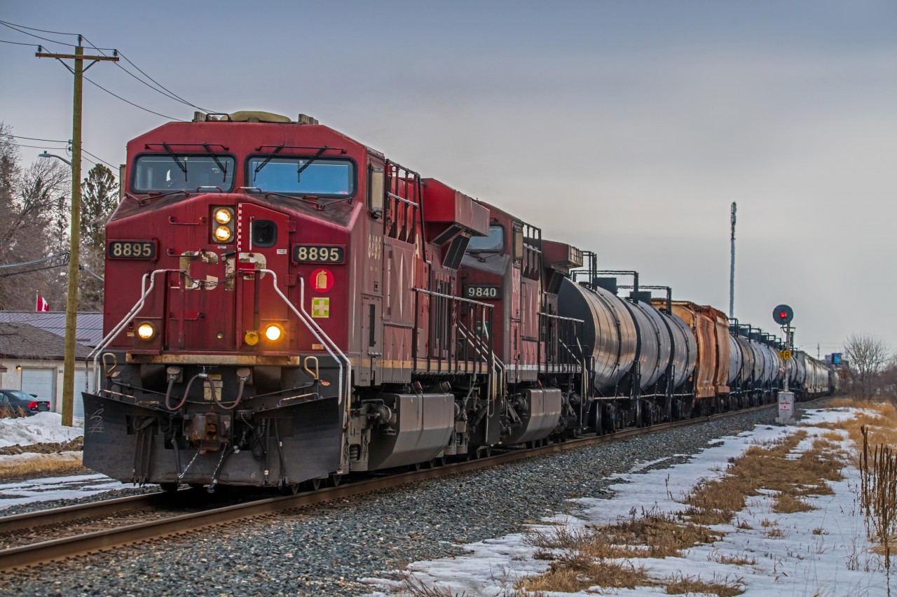 One of CPKC's mixed freight trains heading South through Winnipeg's St. Boniface neighborhood on the way to the United States.