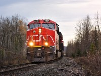 CN 3291, one of the newest ET44AC locomotives on the CN roster pulls a heavy frac sand train up to Fort St John. 