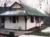 <b>SO THE STORY GOES (PART ONE)....</b>
<br>
<br>
<i>"When I was a kid, I had a friend named Phil. His Dad bought two old train stations and moved them outside of Dundas, and joined them together to make their house. I don't remember exactly where, but the house was high up on a hill. We used to look down below, and watch the steam trains go by. I'm sure its all overgrown now..." </i>
<br>
<br>
Intriguing for any station guy, right? But these little tidbits of information was the real search engine before technology became what we know of it today. And networking with people then, was how this story, was provided by my chiropractor telling me of how the Lomax family built their home.
<br>
<br>
The search began, by driving every sideroad west of Dundas. It made sense, as everything east was becoming heavily built up with urban sprawl. And finally,  just through the trees, before going down and under what would be CN's Dundas Subdivision - was the home of the Lomax family.
<br>
<br>
Here, pictured on a wintry Spring day is part of the house - the old TH&B Stoney  Creek station. The station, used to sit at the base of what is today the 'Old Mountain Road' (now a trail). As automobile use increased, the need for passenger service to smaller towns decreased since the railways 'consolidated' their services to stay competitive. Nonetheless, the station was closed around 1960.
<br>
<br>
NOTE: I've always respected people's property. When arriving, I went to the front door to ask permission. However, no one was initially home. As I was about to leave, a pickup truck arrived. I had the pleasure of meeting Mrs. Lomax (Phil's mother). She had no worries about giving me permission to take or share photos, when I explained to her about the story provided by my chiropractor. As a bonus, I got to see the inside of the home. Both parts. But, I have to thank my chiropractor...without that information I would never have gone on this search. 
<br>
<br>
Part two will come....