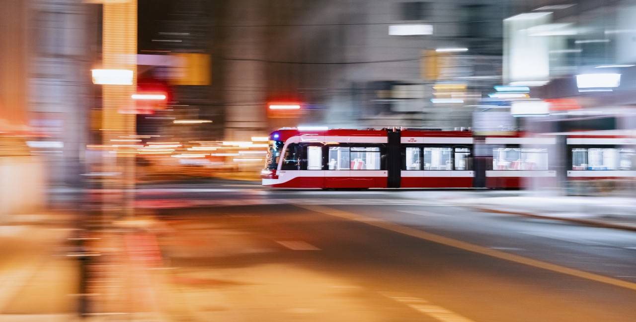 Found this and thought I'd upload it. After working a shift at the Pearl Diver, I was walking to Yonge Street to catch the subway home and snapped this pan shot of an eastbound lowfloor set working a 504 King run.