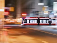 Found this and thought I'd upload it. After working a shift at the Pearl Diver, I was walking to Yonge Street to catch the subway home and snapped this pan shot of an eastbound lowfloor set working a 504 King run.