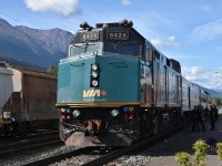 <b> Crew change at Smithers </b> <br>
VIA 6424 leads VIA 006 The Skeena and sits at Smithers, BC Mile 125.2 CN Telkwa Sub. while the Park car on the tail end is at Mile 0.0 on CN's Bulkley Sub. on a beautiful September 4, 2026. <br>
Head end crew members exchange information with each other next to the power as passengers mill about the platform and inside the nicely restored station building. <br>
Even though it is early September, ice and snow can still be seen on the high mountain peaks in the distance. <br>
Great ride, great scenery.