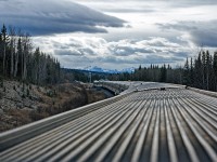 The view of VIA train #1 taking a siding from the dome of Strathcona Park, heading west toward the Rockies somewhere near Hinton, Alberta.
