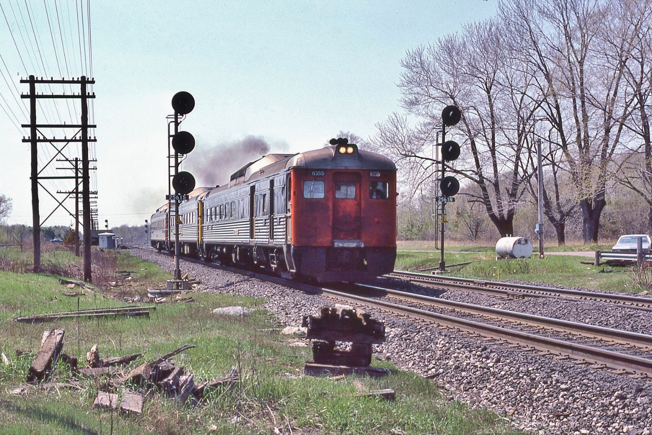 Daily except Saturday 


at CN Grafton, May 4, 1980 Kodachrome by S.Danko


at far right is the '77 Impala


sdfourty