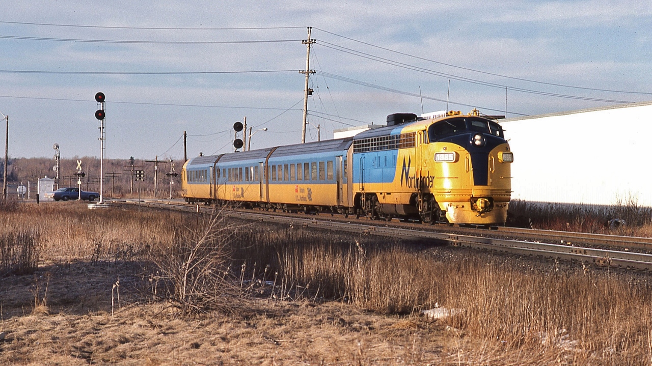 Definitely the CN Bala Sub at Richmond Hill.


My notes have this as VIA #120 Saturday only scheduled 13:10 Union arrival – except the shadows are rather long...


Officially the Northlander trains were ONR #121 and 122. 


The CN weekend  service for  Muskoka and beyond was originally conventional equipment until the mail contracts were canceled, then Budd cars throughout the late sixties / seventies.  And throughout the eighties VIA employed otherwise idle ONR equipment.


And do consider - during this time CN Washago was serviced by 44 passenger trains each week.


At track speed clearing the Elgin Mills crossing March 29, 1980 Kodachrome by S.Danko