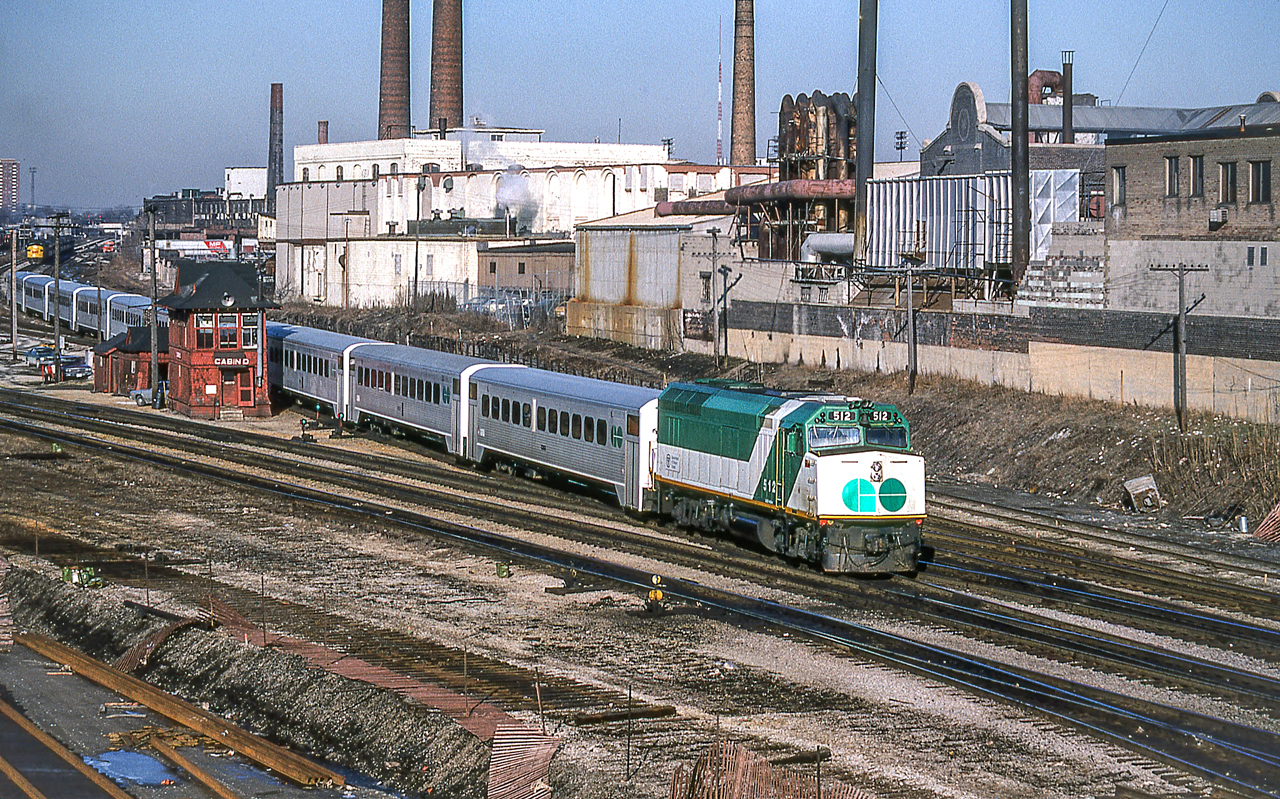 GO 512 is passing Cabin D in Toronto on March 23, 1982.