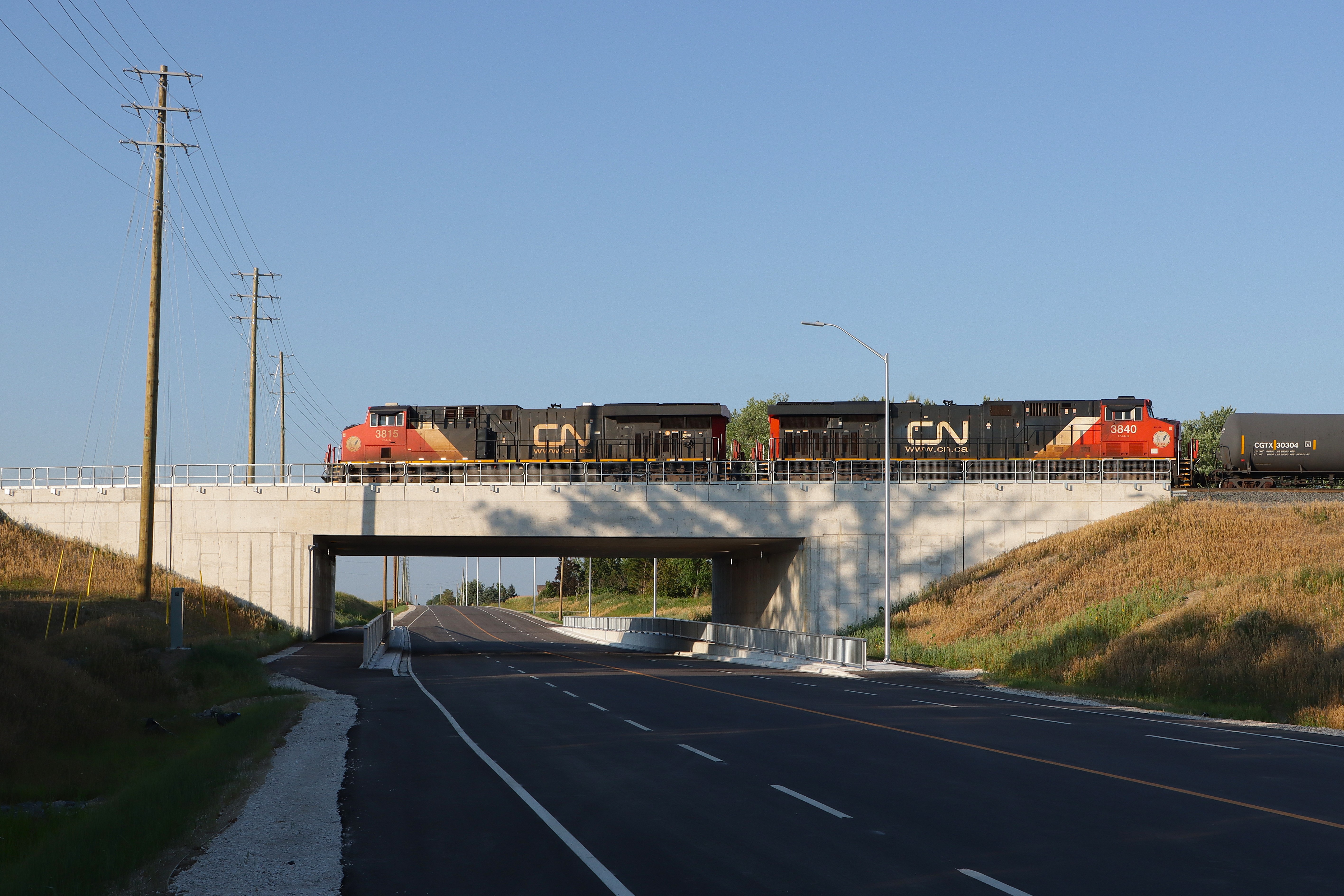 Railpictures.ca - Terry O'Shell Photo: An eastbound works up the grade ...